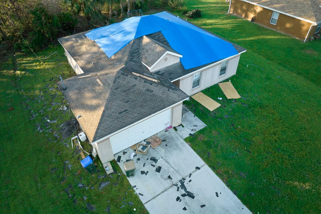 Top View Of Leaking House Roof Covered With Protec 2024 12 07 02 05 04 Utc — roof leak repair by Protech Roofing