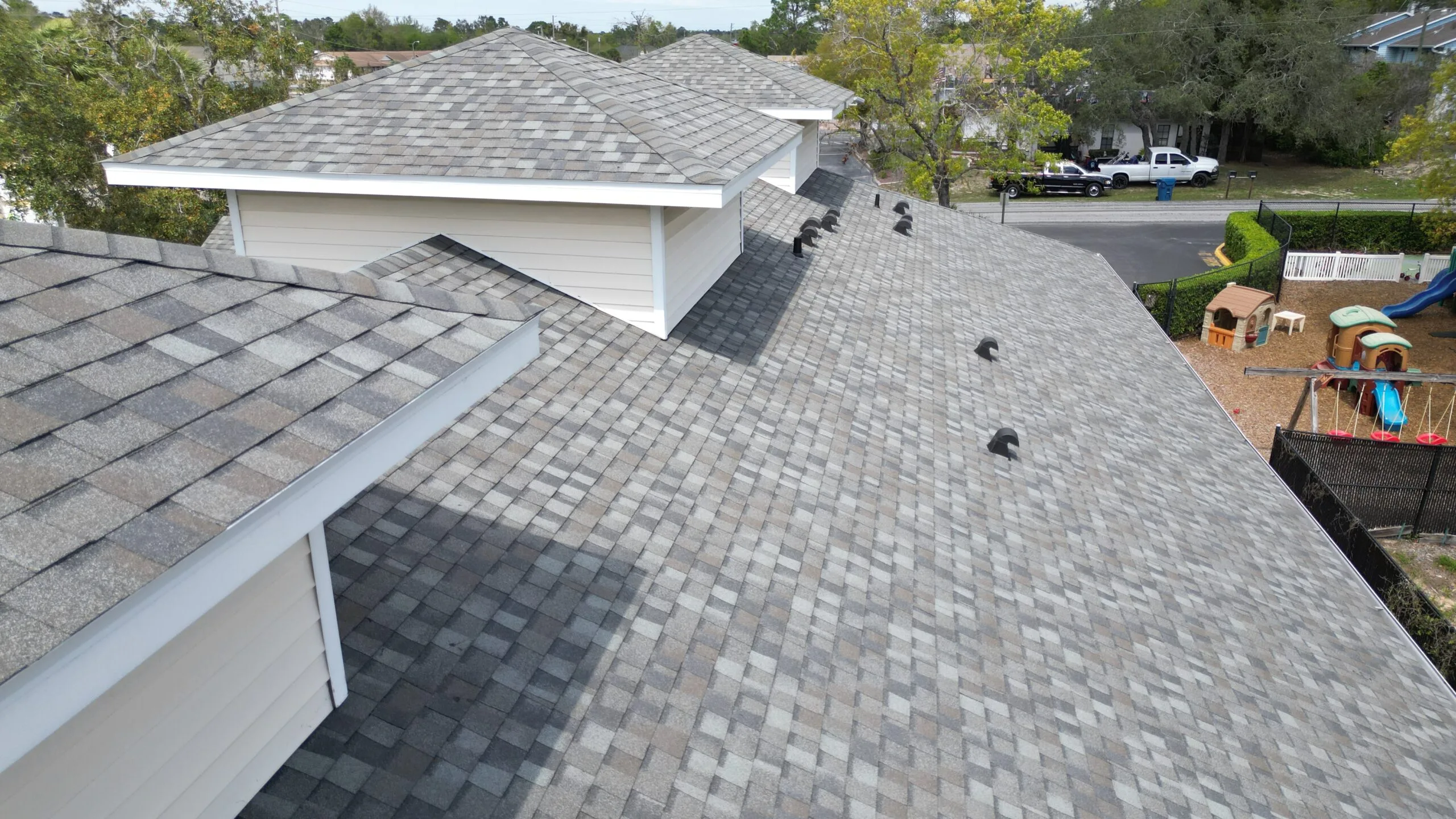 Completed shingle roof installation in Brooksville, FL by Protech Roofing.