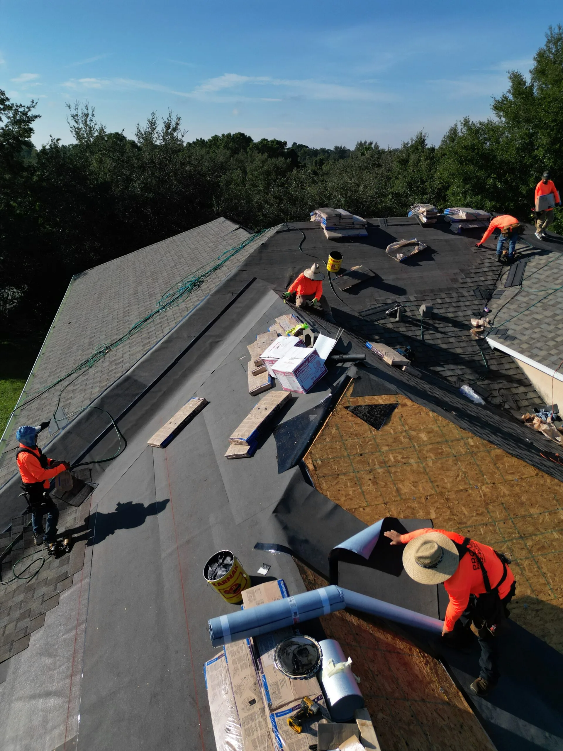 Emergency roof tarping and repair in Brooksville, FL by the Protech Roofing crew.
